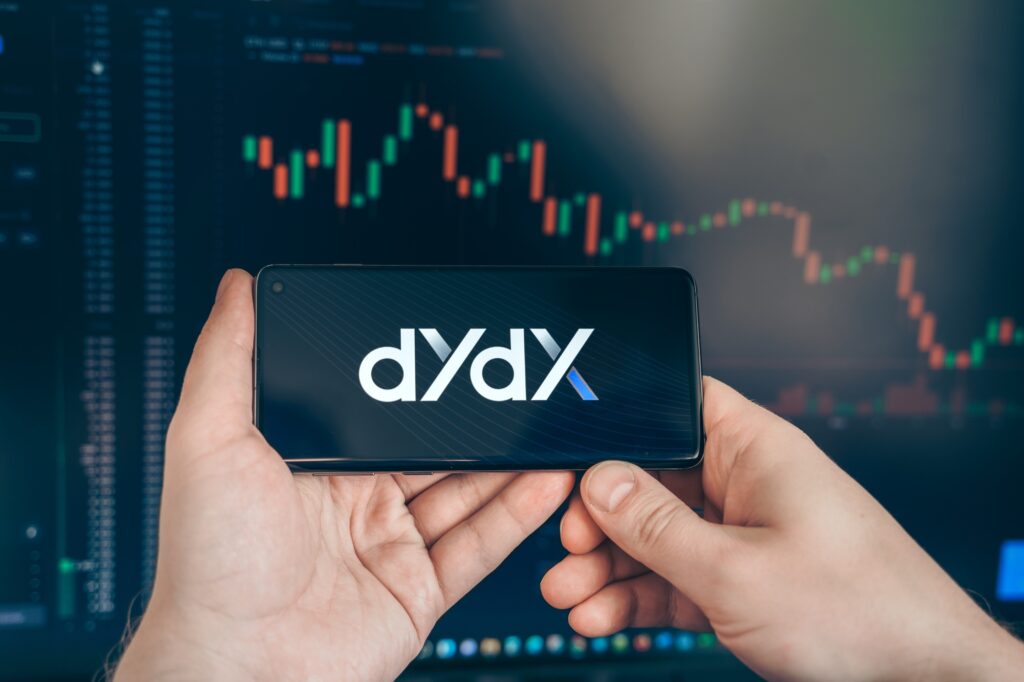 Person trading on the dYdX mobile application